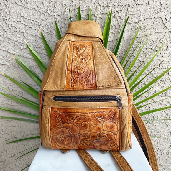 Vintage Handbags - VINTAGE 90s Cognac Tan Genuine Tooled Leather Floral Sling Backpack Bag